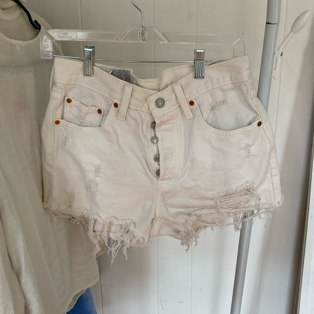 Levi’s Distressed White Denim Shorts
